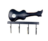 Black iron guitar key hook wall holder with four hanging key rings on bar