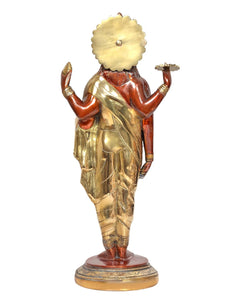 Dhanvantri brass statue rear view, gold robe over red body, raised four-armed form