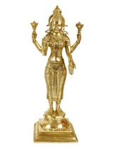 Brass standing Lakshmi goddess statue, symmetrical pose with four raised arms