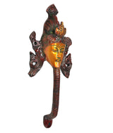 Side view brass Buddha face door handle with red base knob and carved sides