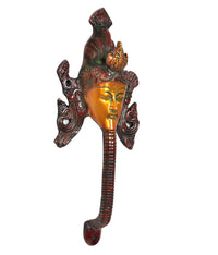 Side view brass Buddha face door handle with red base knob and carved sides