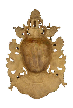 Mud gold brass Tara mask wall hanging, back view with circular cutouts