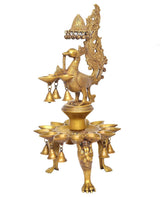 Brass peacock oil lamp stand with 15 bowl tiers and hanging bell accents.