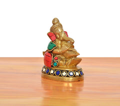 Ganesha brass statue with conch shell, colorful beaded band on base
