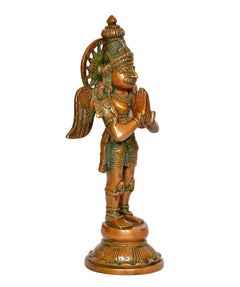 Brass Garuda standing idol statue, right side profile with raised hands, green-gold finish