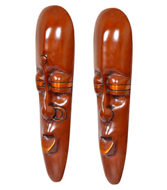 Copper-brown tribal face wall decor set, side view showing nose and eye details