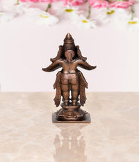 Copper Garuda idol statue, rear view with layered wings and engraved back, 3.5 in