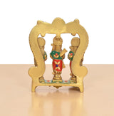 Brass Ram Darbar idol back view: two figures framed by arch behind the base