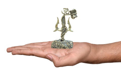 Brass Lord Shiva trishul and damru showpiece held in a hand