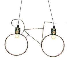 Iron wall light with two hanging circular rings and glowing bulbs, green floral details