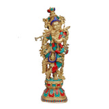 Brass Krishna murti (29 in): gold figure with teal, red, and blue adornments