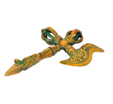 Brass dagger with orange-gold shaft, green details, and patterned curved claw blade