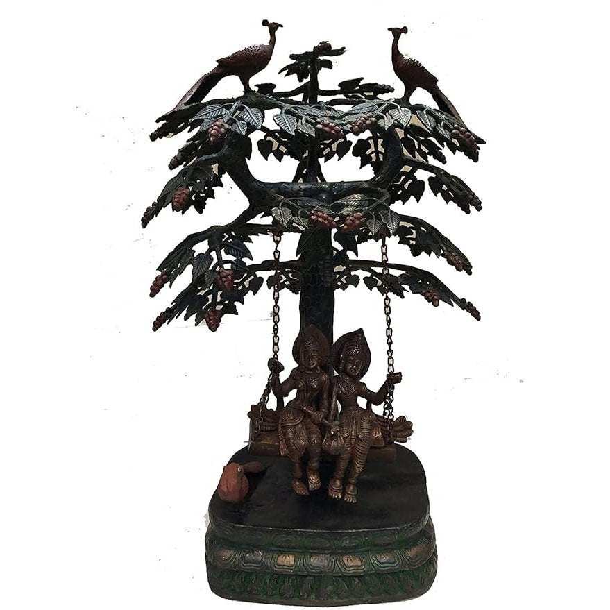 Brass Krishna and Radha swing under tree with peacocks, hanging chains, round base
