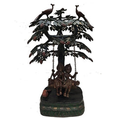 Brass Krishna and Radha swing under tree with peacocks, hanging chains, round base