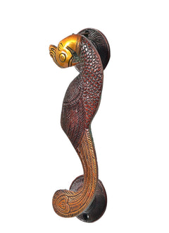 Peacock brass door handle pair, side view with gold head detail and bronze-red wings