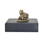 Brass Nandi bull idol on dark rectangular base, front side details