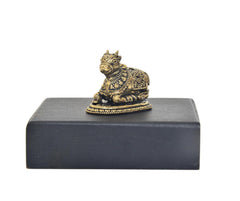 Brass Nandi bull idol on dark rectangular base, front side details