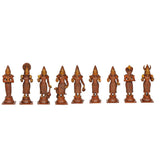 Nine brass Navgraha deity figurines standing in a row on square bases