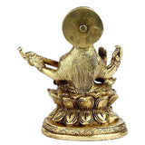 Back view of Brass Saraswati idol (5-inch) with raised disc and patterned base