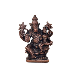 Copper Lakshmi Varaha idol, front view of seated figure with raised hands and attendants