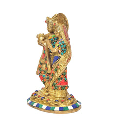 Brass Radha Krishna idol side view with colorful beadwork and patterned halo back