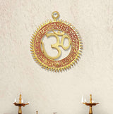 Round metal wall hanging with carved Gayatri mantra and gold Om symbol, hanging loop