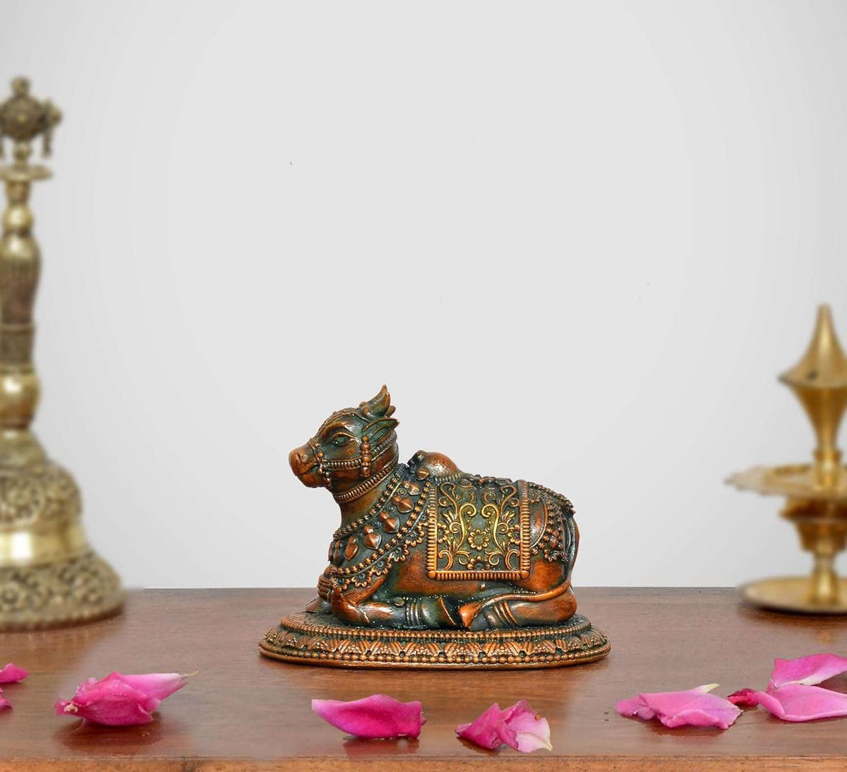 Brass Nandi seated statue with ornate multicolor detailing on body and base