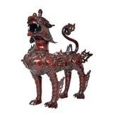 Temple lion statue, metallic dark red-brown finish, front view, detailed armor on legs and body