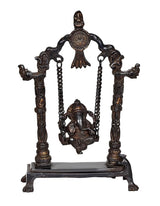 Ganesha brass swing statue idol with four carved pillars, chains, and seated figure