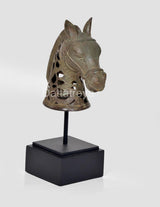Bronze horse head figurine on stand, profile view, ornate cutout mane, black base