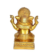 Brass Ganesh statue with detailed back, circular halo crown, seated on square pedestal