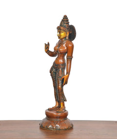 Brass goddess statue, standing on round base, raised blessing hand, patterned garment