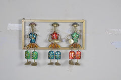 Marwari musician doll set of 3 in gold frame on light gray wall