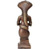 Brass Patanjali statue rear view, detailed serpent hood and textured body