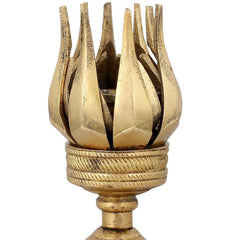 Brass oil wick lamp with decorative tiered stand and flame-shaped outer cup