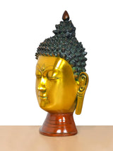 Buddha head wall hanging in gold with dark textured crown and long ear ornaments