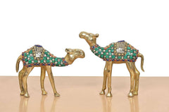 Brass camel figurine pair, one facing left and one facing right with enamel decoration
