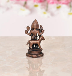 Copper Kal Bhairav idol, back view, trident and small hand-held ornaments