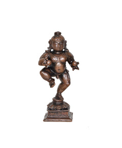Copper Bal Krishna dancing figurine, 3.5 in, on pedestal (full view)
