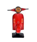 Red scooter collectible table topper with circular clock, red wings and black platform