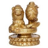 Brass Shiv Parvati bust idol, back/side view showing hair detailing and engraved base