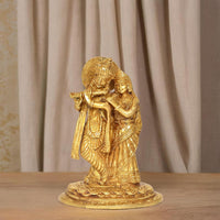 Gold-tone Radha Krishna idol statue, close pose with detailed crowns and jewelry