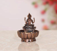 Copper Lakshmi Maa urli bowl, 3-inch height, lotus bowl with raised pedestal and deity.
