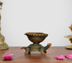 Mini brass tortoise oil lamp diya statue with raised lid, green and gold detailing