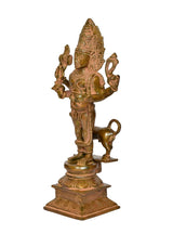 Brass Kal Bhairava idol side view, detailed arms and ritual objects on plinth