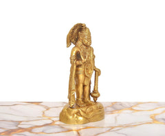 Brass Hanuman Ji idol, profile view holding a staff with detailed armor