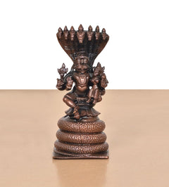 Copper Lakshmi Narasimha idol, detailed face and five-hood Sheshnag, centered