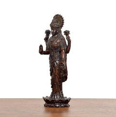 Lakshmi standing idol from front-left, detailed beaded chest and draped skirt