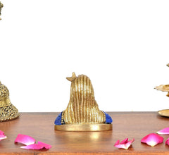 Brass Adiyogi Shiva idol, back view with blue shoulders and ridged hair, gold base