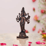 Copper Panchmukhi Hanuman idol, side view with five arms holding weapon-like staffs